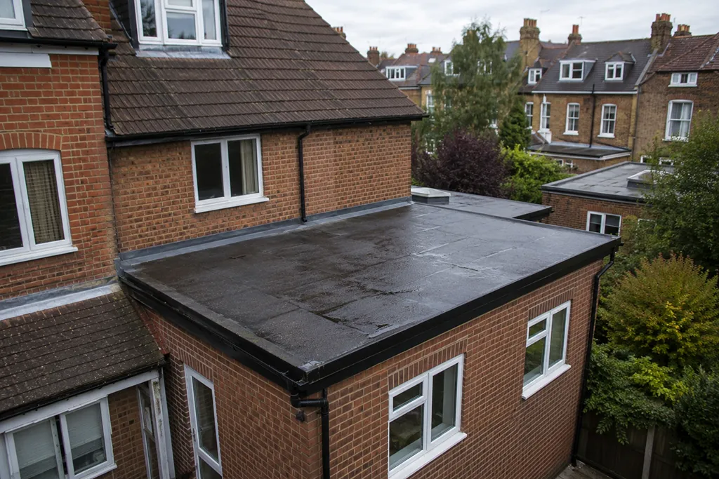 Residential property in London with flat roof membrane visible in context